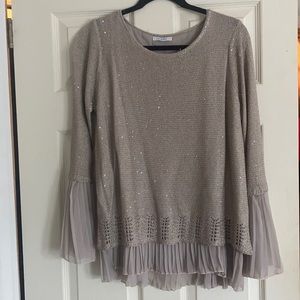 Knitted sequin sweater with ruffle underlay